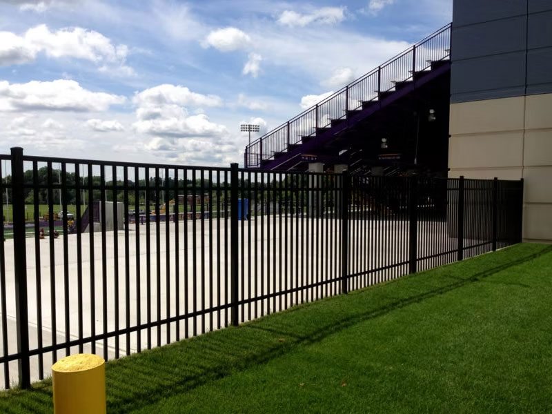 Black ornamental fence at a stadium