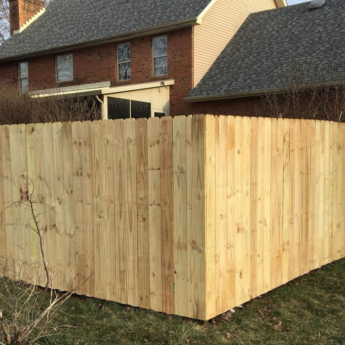 Wood privacy fence, posts set and pickets up