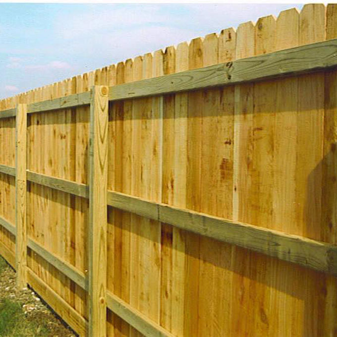 Wood privacy fence from the back side of the posts